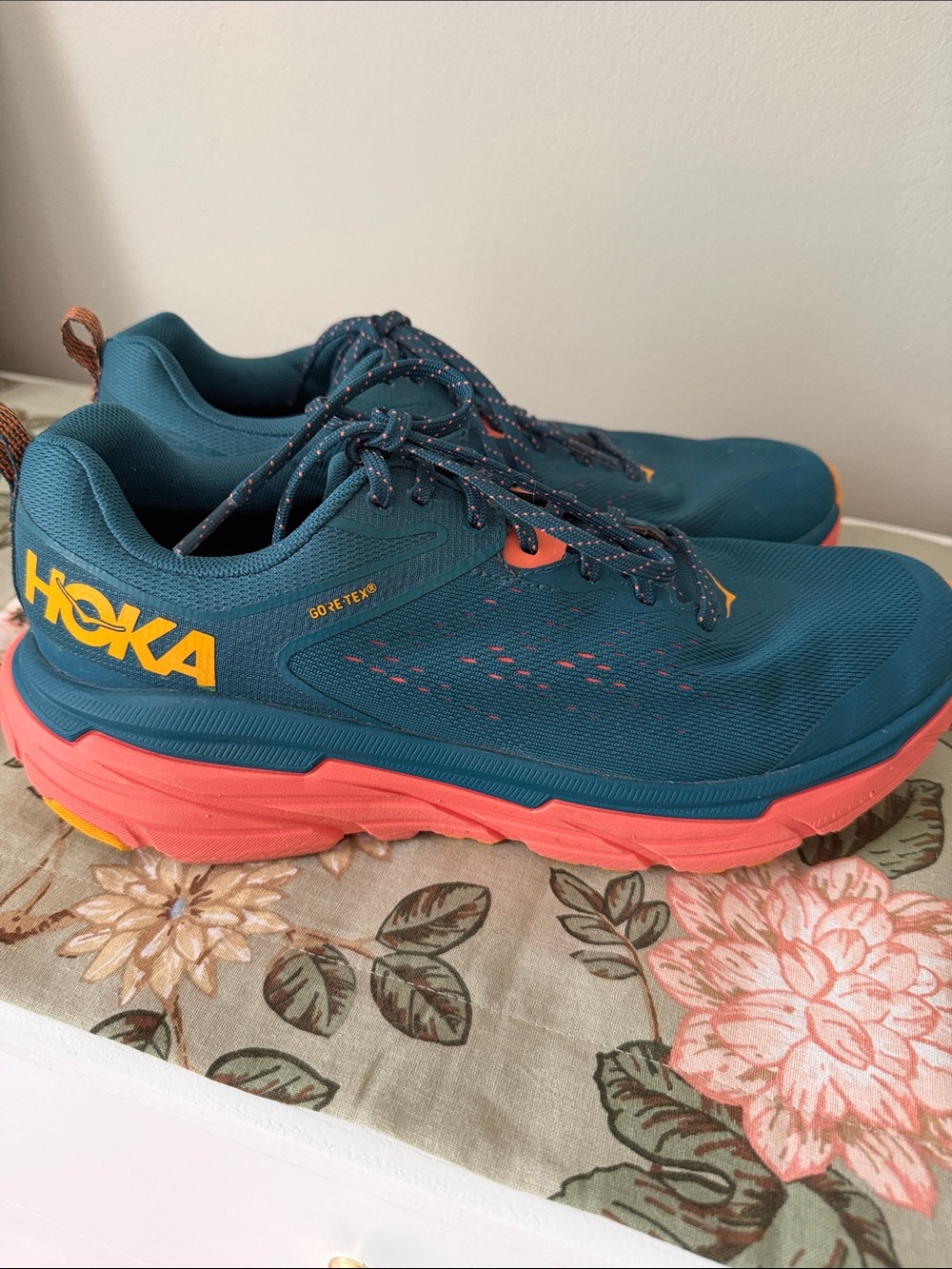 Hoka Teal Running Shoes with Coral Soles and Yellow Logo